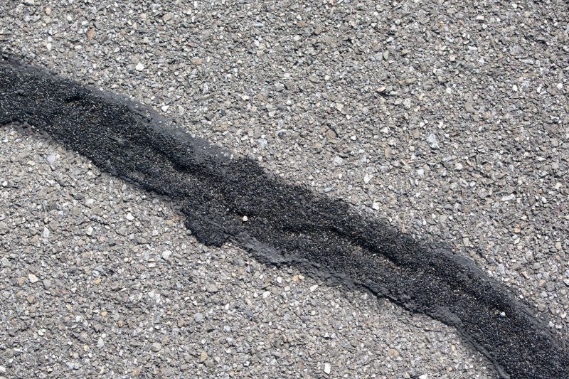 Driveway Sealing And Crack Repair Pros detail
